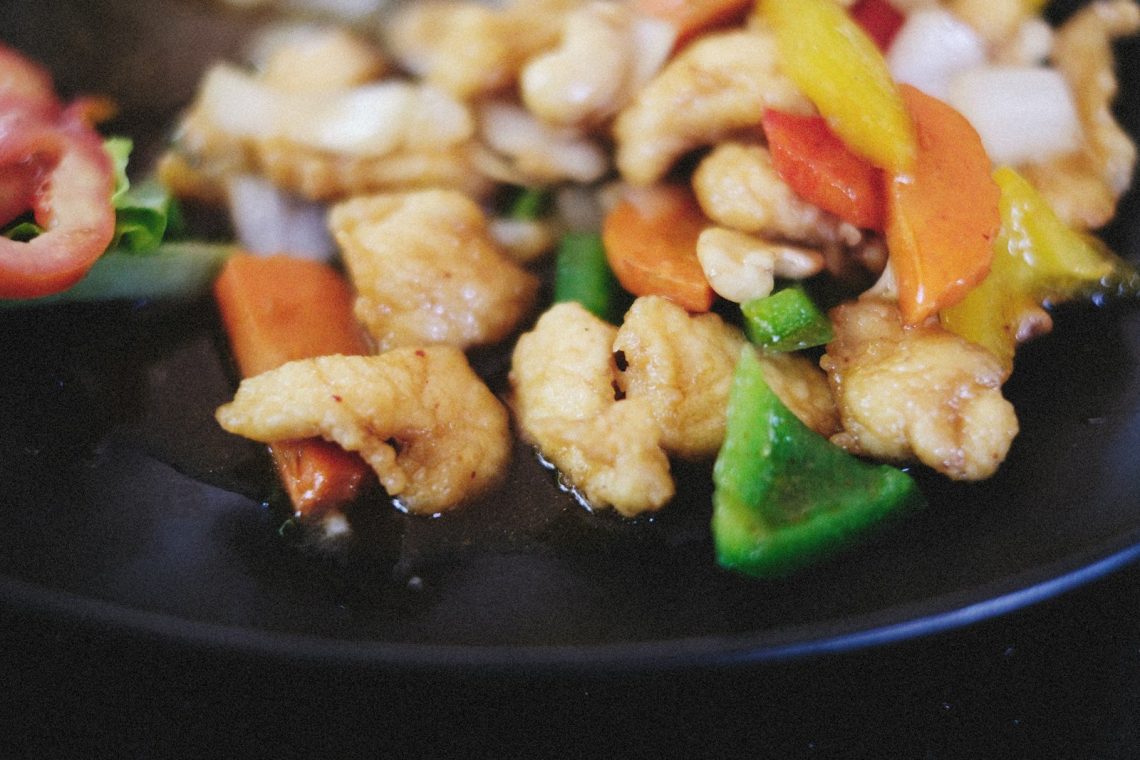 a close up of a plate of food with vegetables