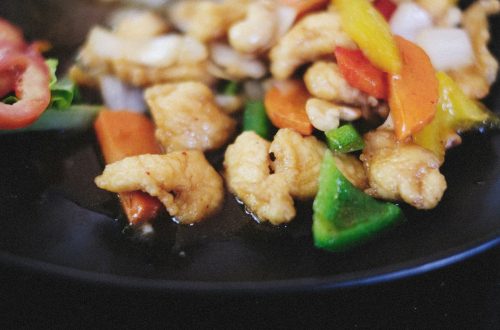 a close up of a plate of food with vegetables